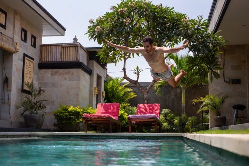 man-jumping-on-pool-3280801
